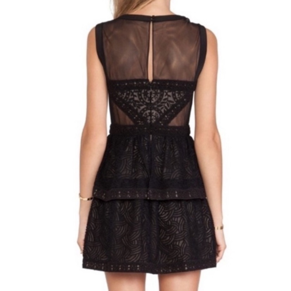 BCBG MaxAzria Joselyn Black
Illusion Lace Cocktail Party Mini Dress
SZ 0 - Picture 4 of 8